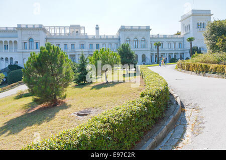 YALTA, RUSSIA - SEPTEMBER 28, 2014: people in park of Grand Livadia Palace in Crimea. Livadia estate was summer residence of the Stock Photo