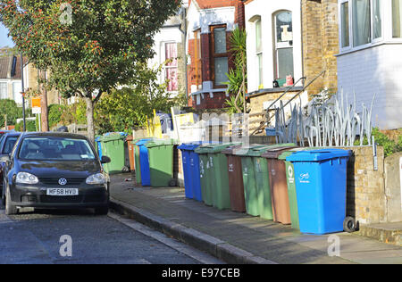 Domestic refuse recycling Wheely bins on the pavement in South London Stock Photo