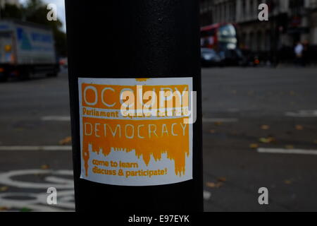 London, UK. 21st October, 2014. Sticker stating the intention to occupy until 26th oct Credit:  Rachel Megawhat/Alamy Live News Stock Photo