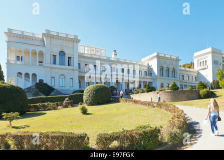 YALTA, RUSSIA - SEPTEMBER 30, 2014: people walking in park of Grand Livadia Palace in Crimea. Livadia estate was summer residenc Stock Photo