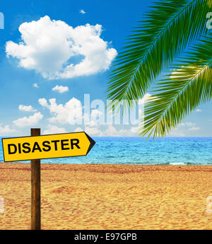 Tropical beach and direction board saying DISASTER Stock Photo