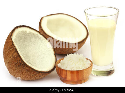 Fresh Coconut with milk in a glass over white background Stock Photo