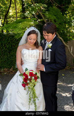Bride and groom getting married wedding at the Marin Art and Garden Center in the city of Ross in Marin County California Stock Photo
