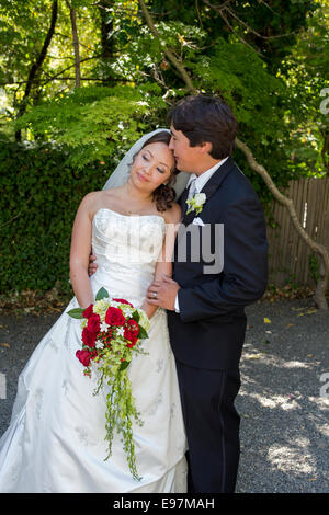 Bride and groom getting married wedding at the Marin Art and Garden Center in the city of Ross in Marin County California Stock Photo