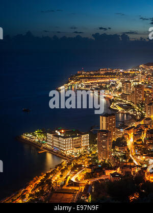 Aerial view of the illuminated French Riviera coastline at night ...