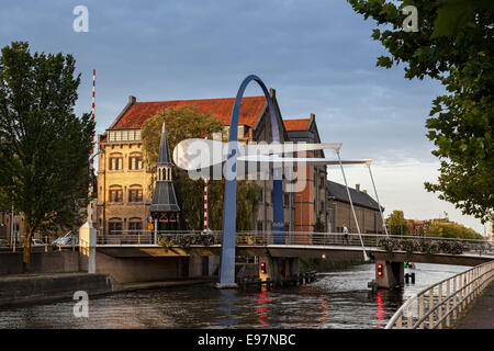 This bascule style bridge is build over a canal in Leeuwarden and a gateway to the town center of Leeuwarden Netherlands. Stock Photo