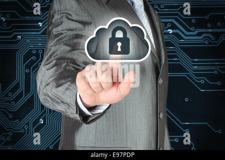 Businessman pushing virtual cloud security button on digital background Stock Photo