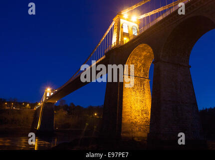 Thomas Telford's Menai Suspension Bridge at night twilight dusk Menai Bridge Porthaethwy Ynys Mon Anglesey North Wales UK Stock Photo