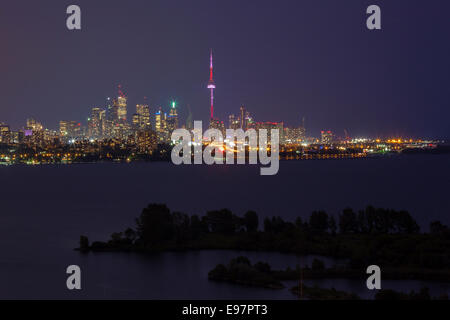 Toronto skyline over Lake Ontario with Humber Bay Park in the foreground at dusk. Toronto, Ontario, Canada. Stock Photo