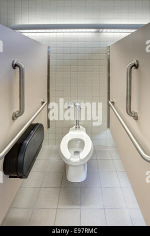 The stall for disabled access in a modern mens's room Stock Photo