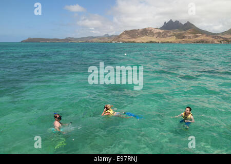 Activity holiday; People snorkeling in the Indian Ocean, Mauritius Stock Photo