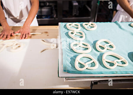 Pretzels placed on a baking tray Stock Photo