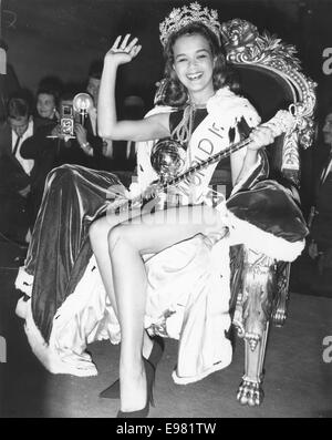 Nov 7, 1963 - London, England, United Kingdom - Miss Jamaica CAROLE JOAN CRAWFORD sits on the throne after being crowned Miss World at the Lyceum. At age 20, the 5'3' (1.59 m) beauty, short by Miss World standards, made history by becoming the first delegate from her country to win the title. She wore a specially designed swimsuit with a high neck in the Miss World final in order to look taller. Jamaica Post issued a stamp of her face in honor of Crawford winning the Miss World title, which had an issue of three million stamps. She later moved to Canada and married. (Credit Image: © KEYSTONE P Stock Photo