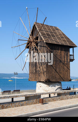 Old wooden windmill on the sea coast, the most popular landmark of old Nesebar town, Bulgaria Stock Photo