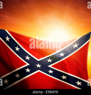 Confederate flag in front of bright sky Stock Photo