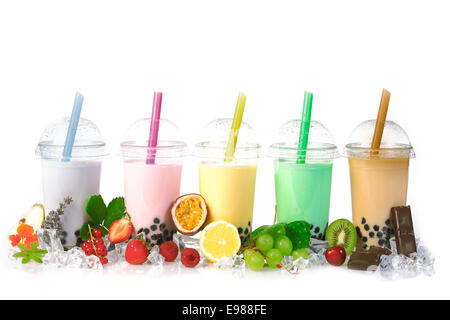 Various Bubble Tea in a row isolated on white background with different fruits. Stock Photo