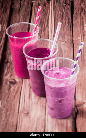 Variety of delicious berry smoothies with strawberry and blueberry blended with low fat yogurt for a healthy summer drink, high Stock Photo