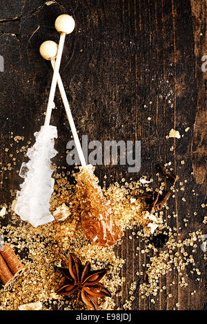 Tea sweetener sticks for winter drinks on a rustic board for xmas celebrations Stock Photo