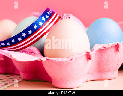 easter eggs in a box with an american bow Stock Photo