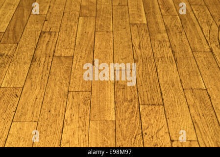 Old Parquet Flooring in perspective view as interior backdrop or background. Stock Photo