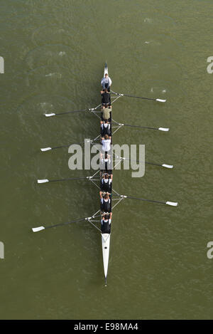 NOVI SAD, SERBIA - OCTOBER 18, 2014: Eightr men rowing on Danube River in Novi Sad on traditional remote regatta competition. Stock Photo