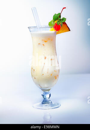 Pina Colada drink with a pineapple slice an a cocktail cherry. Many other cocktails in my portofolio. Stock Photo