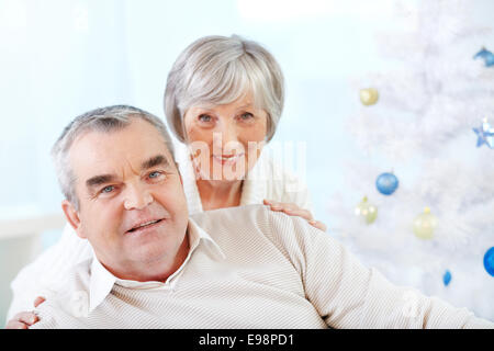 Senior man and woman looking at camera Stock Photo