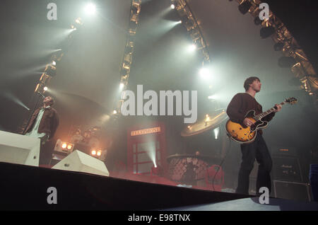 Oasis in concert in Glasgow, Scotland, in 1997. Stock Photo
