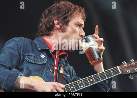 Simon Fowler of Ocean Colour Scene appear live on stage at 'T In The Park' music festival, in Scotland, in 1997. Stock Photo