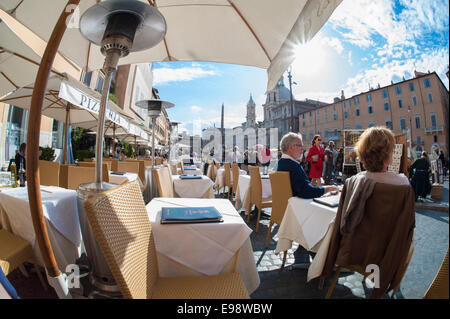 At leisure on Piazza Navona, Rome, Italy. Stock Photo