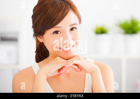 close up of beautiful and smiling  asian young woman at home Stock Photo