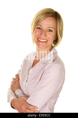 Beautiful Woman  with Short Blond Hair on a White Background in her Forties Smiling. She is wearing business casual clothes Stock Photo