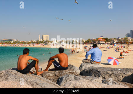 People on the beach in Dubai, Jumeirah beach Stock Photo