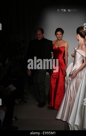 NEW YORK, NY - OCTOBER 12: Designer Charles W. Bunstine II and models walk the runway at the Anna Maier / Ulla-Maija Couture Fall 2014 Bridal collection show at the Hilton New York on October 12, 2014 in New York City. Stock Photo