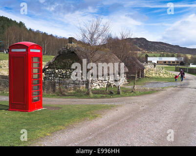 dh Highland Folk Museum NEWTONMORE INVERNESSSHIRE 1930s phonebox crofters cottage woman child scotland cairngorms red telephone box Stock Photo