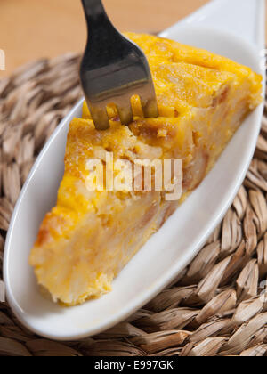 Portion of Spanish omelette, also called 'tapa' Stock Photo