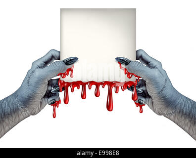 Zombie hands sign as bloody a monster holding a blank blood dripping card sign on a front view as a creepy halloween or scary symbol with textured skin monster fingers and stitches isolated on a white background. Stock Photo