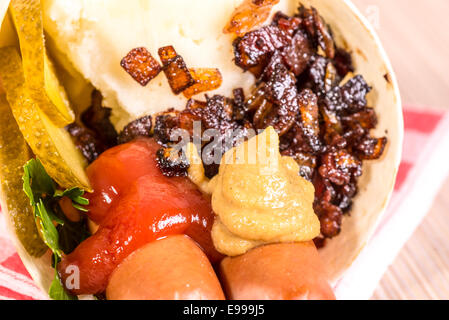 sausages and mash in a cone of flat cake (tortilla) Stock Photo
