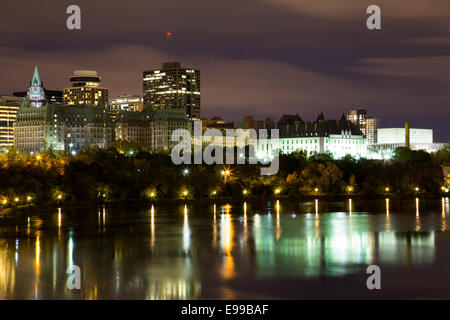 Part of the Ottawa Skyline at Night showing reflections in Ottawa River Stock Photo