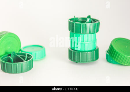 Stock Photo - Colorful plastic caps isolated in white Stock Photo