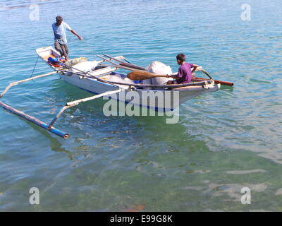 Sablayan, Philippines. 22nd October, 2014. Sablayan town is composed of 11 coastal villages and fishing is the main source of income of the people living near the sea. Due to the efforts of the local government to protect marine sanctuaries and tough fishing laws, Sablayan is harvesting big catch. Since 2010, Sablayan is harvesting gigantic tuna for exports. The town also is the main producer of fish in MIMAROPA region. © Sherbien Dacalanio / Alamy Live News Stock Photo