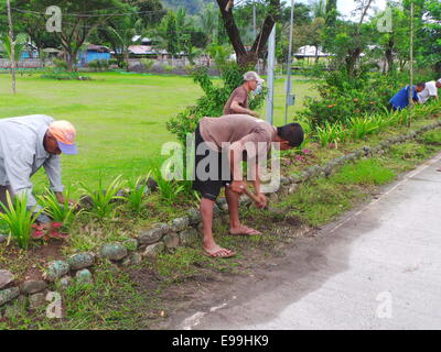 Sablayan, Philippines. 22nd October, 2014. Prisoners at Samblayan Penal Compound in Occidental Mindoro are allowed to live outside prison cell where inmates can do freely farming, fishing, and tour guide for bird watchers at Mt. Siburan lowland forest and live like “free people” doing their daily chores as if they are free people living inside the prison compound.  © Sherbien Dacalanio / Alamy Live News Stock Photo