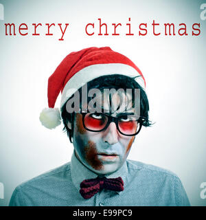 the sentence merry christmas and a hipster zombie wearing a bow tie and glasses and a santa claus hat Stock Photo