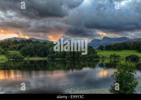 Sunset at Loughrigg Tarn in Lake District Stock Photo
