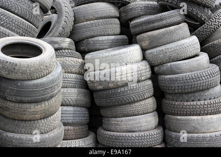 background with old tires on each other Stock Photo