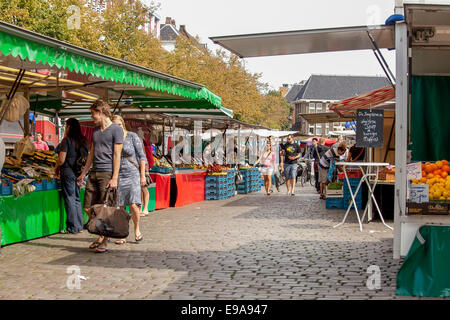 People shopping on a farmers market Stock Photo