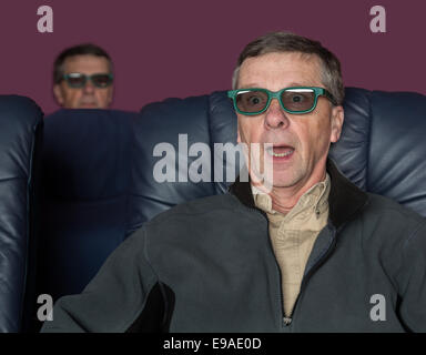 Senior man watching movie with 3d glasses Stock Photo