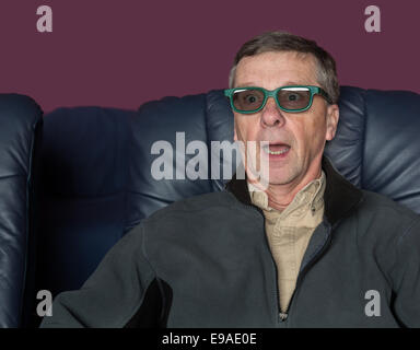 Senior man watching movie with 3d glasses Stock Photo