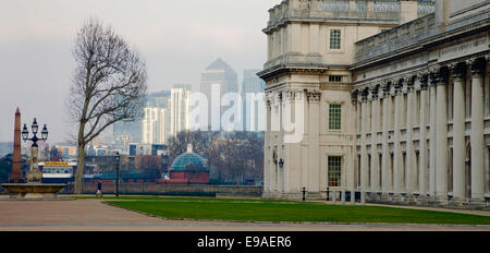 The traditional Old royal naval college and with the ultra modern Canary Wharf in the background, Greenwich, London. Stock Photo