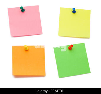 Color post-its with drawing pins Stock Photo